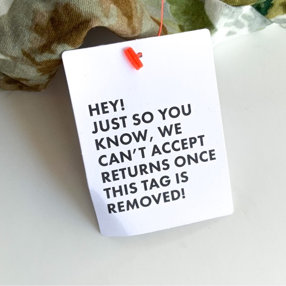 ASOS DESIGN Halter mini dress with bow back in floral print - Picture 14 of 14